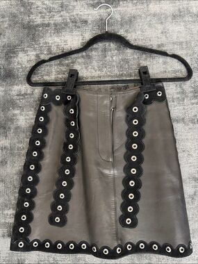 Women’s Black Leather Maje Mini Skirt with Black Suede Eyelet Trim